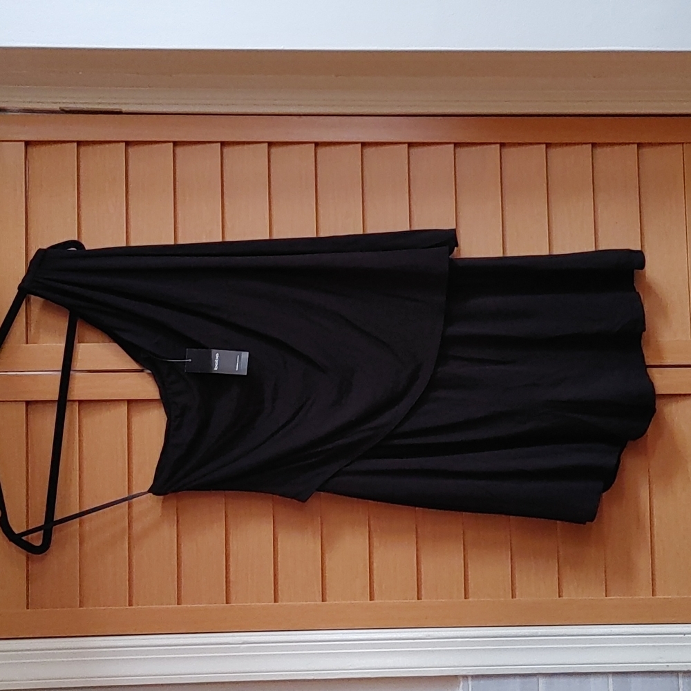 Bebe size medium one shoulder romper.
